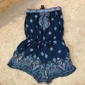 Blue patterned romper with tie waste!